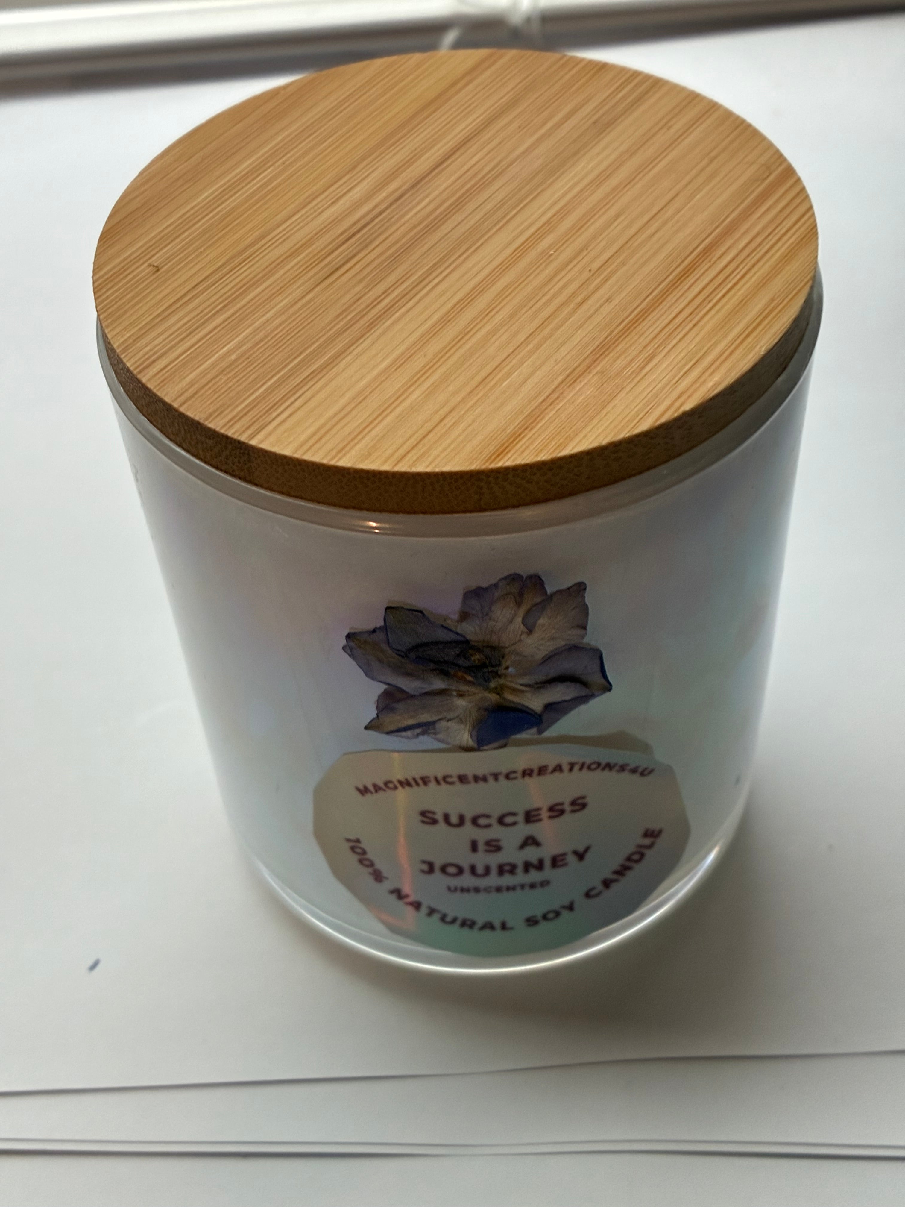 Success Is A Journey motivational soy candle in frosted glass jar with bamboo lid and blue floral design