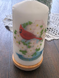 North Carolina Birds and Blooms Pillar Candle with cardinal and dogwood design on bamboo base