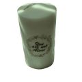 Handmade sage green pillar candle with You Are Not Alone floral wreath design